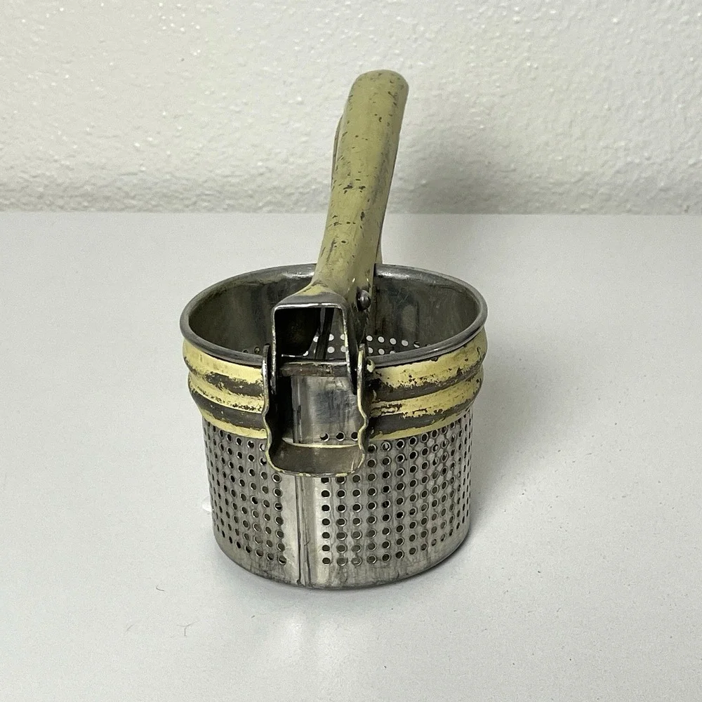 Vintage Potato Ricer Yellow Handle Metal Unmarked Made in USA